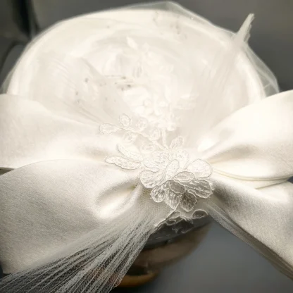 Bridal White Clip-on Fascinator with Bow Design - Image 6